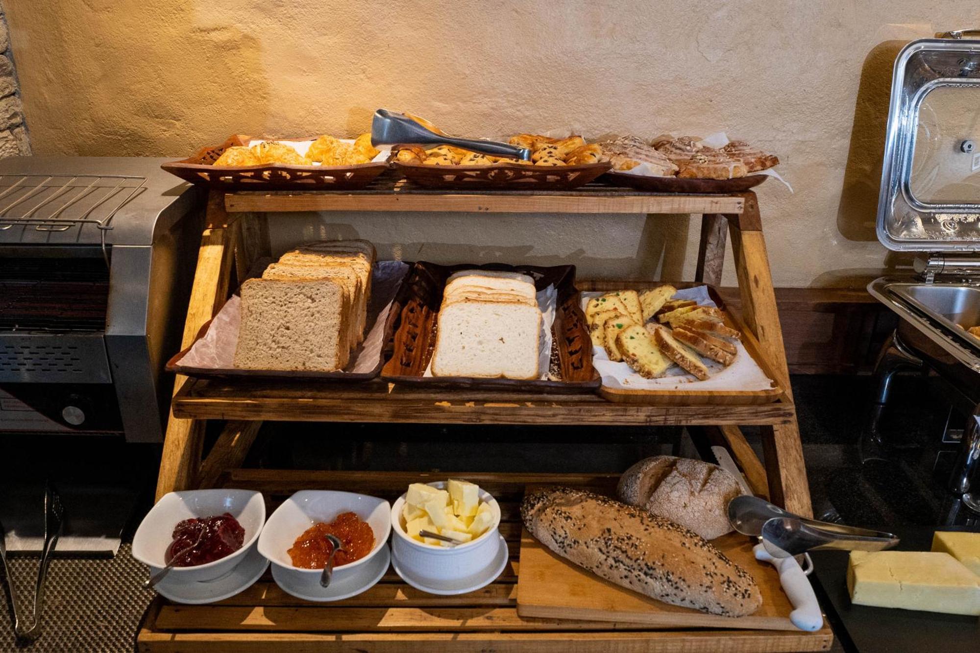 Bar Peepal Resort โพคารา ภายนอก รูปภาพ A selection of cheeses at a buffet