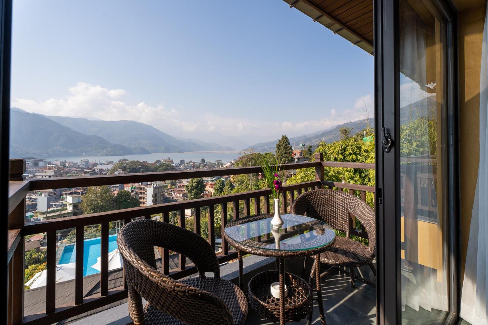 Bar Peepal Resort โพคารา ภายนอก รูปภาพ A view of Lake Biwa from a guest room